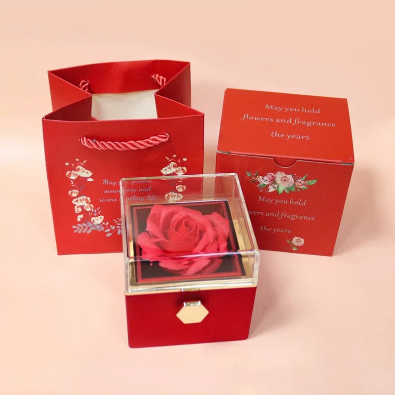 Cadeau showroom Rouge Boîte-cadeau rose rotative et présentoir à bijoux